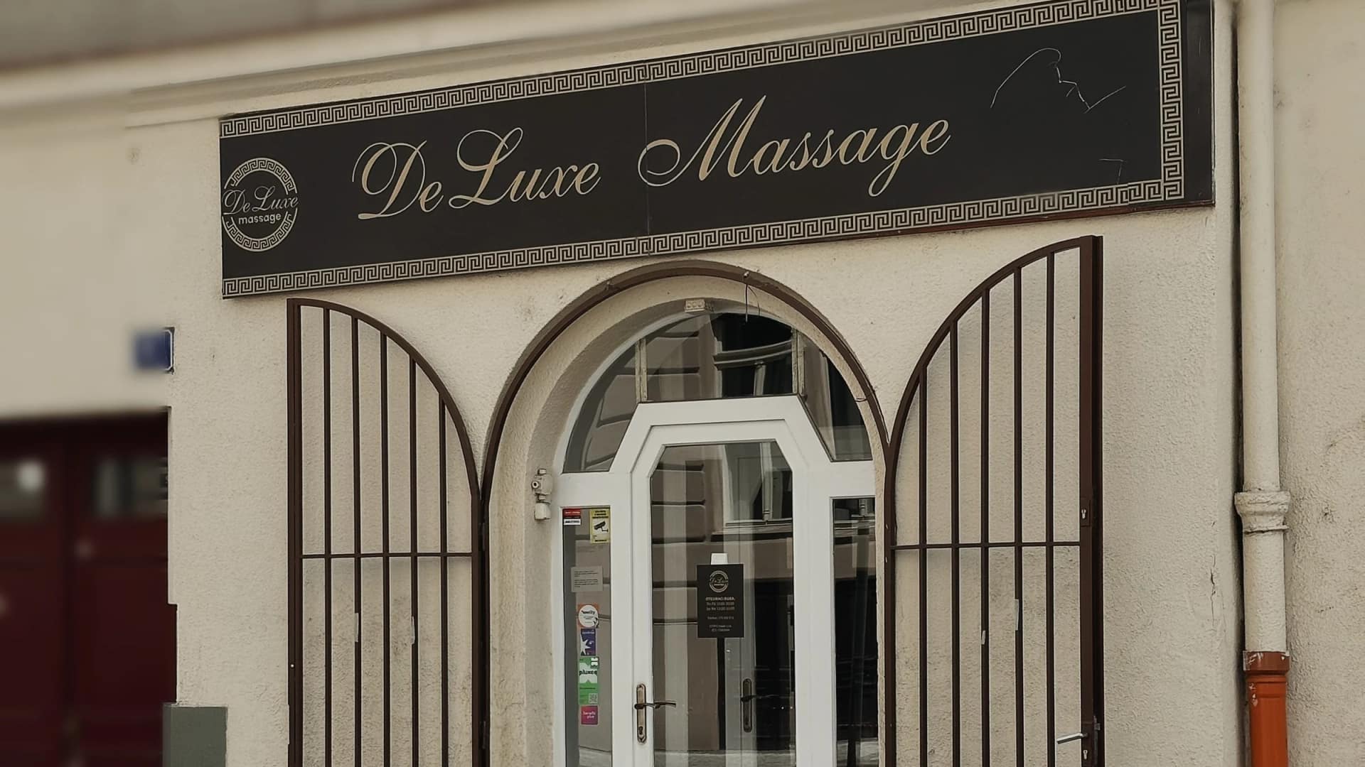 Street frontage of the building that houses the Massage DeLuxe salon